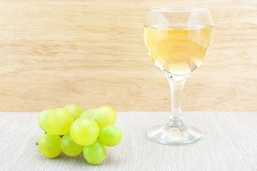 Grape and wine on the table