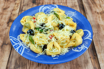 Tortellini with cheese and olive