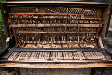 Fototapeta na wymiar Old piano in Uzupis. Lithuania, Vilnius
