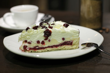 Cup of coffe with cake and beans