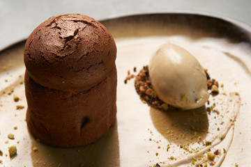 Exclusive restaurant dessert food served on a table. Fondant cak