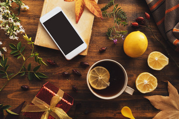 Smartphone mock up with autumn season decoration
