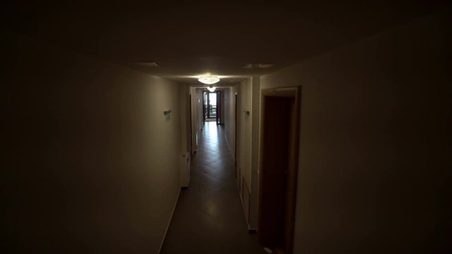 POV walk through hotel corridor