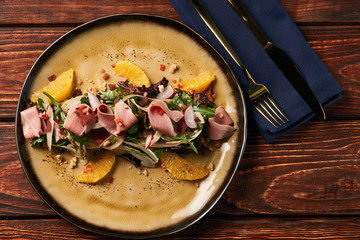 Exclusive vegetable salad with Smoked duck breast, close-up