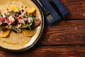 Exclusive vegetable salad with Smoked duck breast, close-up
