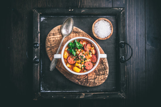 Stew with cabanossi peppers and beans