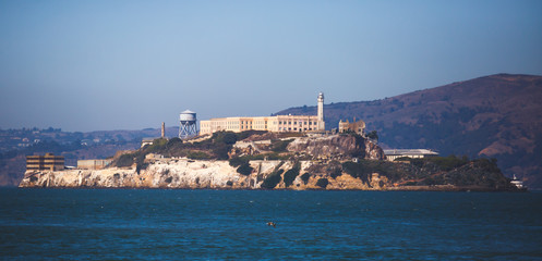 Naklejka premium View of Alcatraz Island with famous prison in San Francisco Bay Area, California, United States, summer sunny day