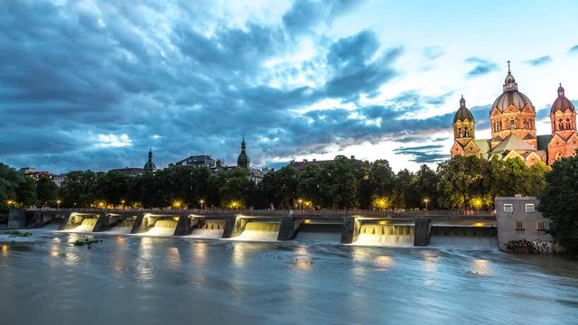 Munich - Isar river and St. Lukas Church 4K timelapse, day to night lapse.