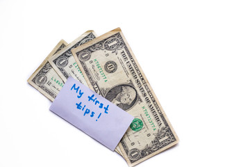 Banknotes of 1 american dollar isolated on white background. First earned money. Tips in restaurant. Copy space for text