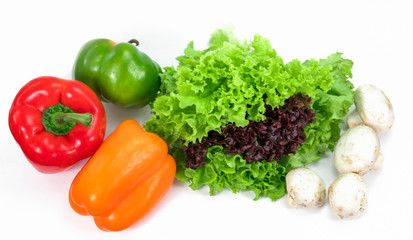 lettuce, bell pepper and mushrooms on a white background