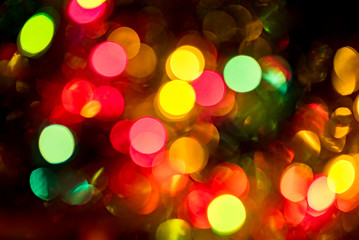 Obraz premium Colorful circles of light abstract background. Color blur. Boken. New year.