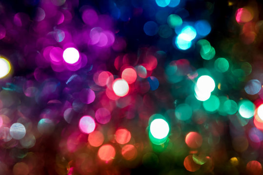 Colorful circles of light abstract background. Color blur. Boken. New year.