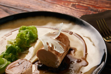 Boiled chicken sausage meat with baked green cabbage