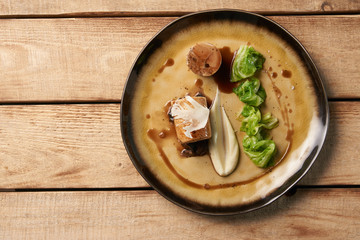 Boiled chicken sausage meat with baked green cabbage