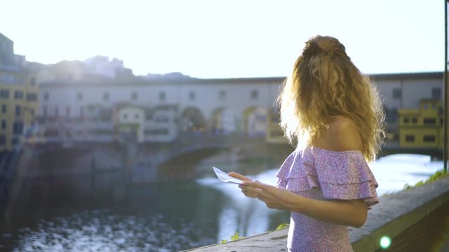 Young Lady Search Location On Florence City Map, Tourist Woman Lost In Town