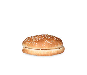 Hamburger bun with sesame seeds isolated on white background