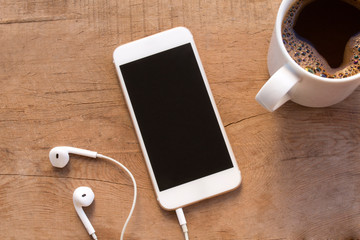 Mobile phone on wooden table