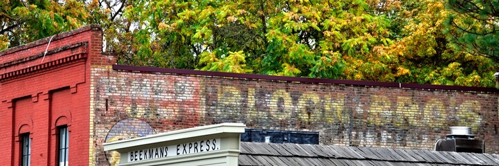 Beekmans exterior brick with ghost sign