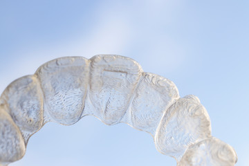 Invisible bracket teeth aligners
