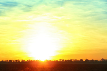 Picturesque view of beautiful sky lit by setting sun