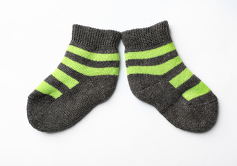 Cute child socks on white background, top view