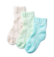 Cute child socks on white background, top view