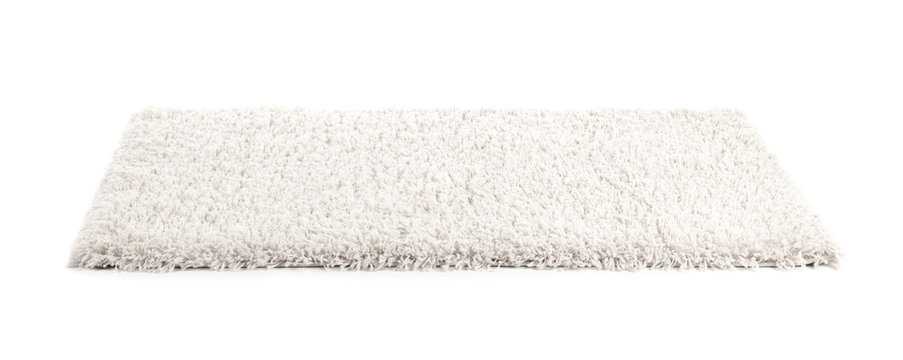Fuzzy carpet on white background. Interior element