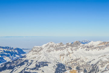 Fototapeta na wymiar Snow landscape in winter of Alps Mount Titlis in Switzerland