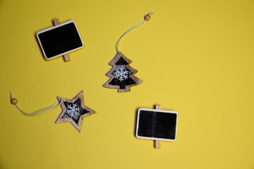 Mini chalk boards with star and Christmas tree decorations. Copceptual idea on flat lay with copy space