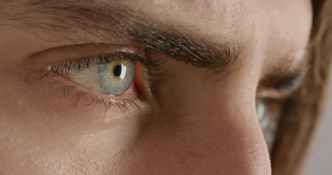 close up eyes opening beautiful blue iris optometry concept