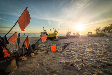 Sunrise over fishermans sea bay