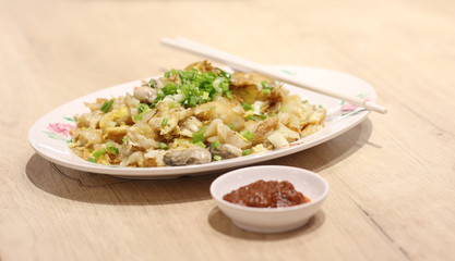 shellfish fried put eggs on table