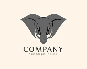 Cartoon head elephant from front view logo design inspiration