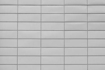 wall covered with rectangular gray metal plates