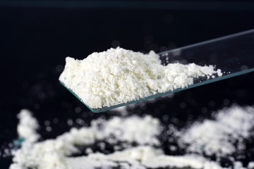 Chemical powder from the chemistry kit with macro lens photographed in studio