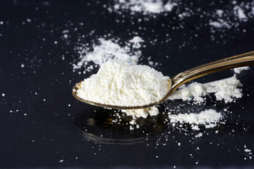 Chemical powder from the chemistry kit with macro lens photographed in studio