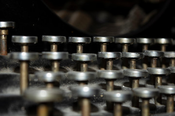 Antique typewriter, model Olivetti Ivrea M20 - 1920 - Detail of the keys and the mechanical parts. Ancient and warm colors.