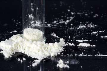 Chemical powder from the chemistry kit with macro lens photographed in studio