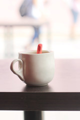 coffee cup on wooden table