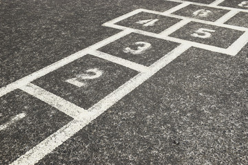Childrens Hopscotch Game on Concrete in a School Playground