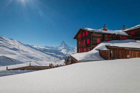 Hotel and mountain restaurant Fluhalp with Matterhorn, Zermatt, Switzerland.