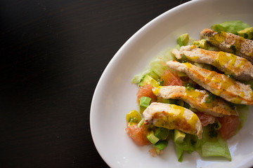 healthy Chicken salad served on a white plate