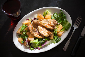 healthy Chicken salad served on a white plate