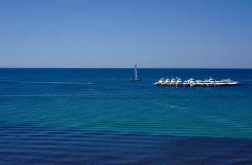 Boats on sea with blue sky background