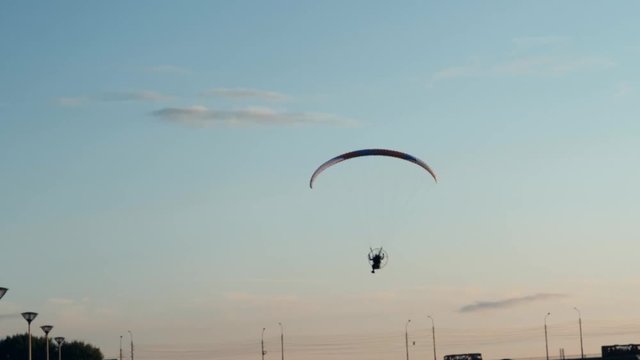 Paraplane on the blue sky background, leisure activity.