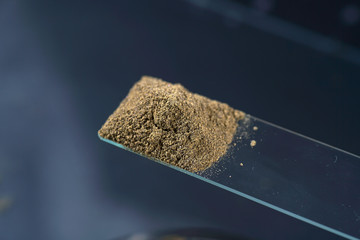 Chemical powder from the chemistry kit with macro lens photographed in studio