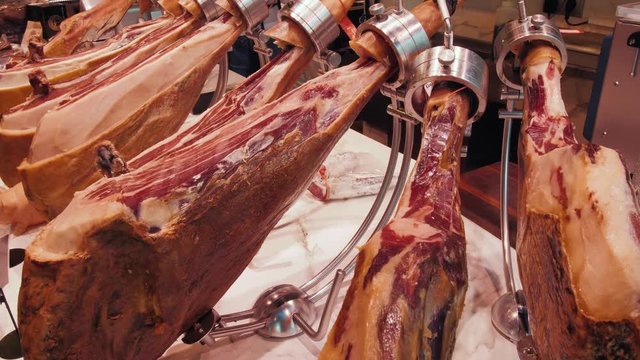 Jamon. Jamon serrano. Traditional Spanish ham close up. Dry cured spanish pork ham on market