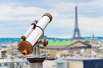 Tourist binocular telescope for Paris city observation from Lafayette gallery viewpoint to Eiffel...