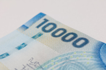 Obraz premium Chilean money notes. Chile ten thousand (10000) pesos. Selective focus.