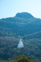 Luang Por Khao or white big Buddha on Si Siat Mountain,Wat Theppitak Punnaram,Phaya Yen,Pakchong district,Nakhon Ratchasima,northeastern Thailand.The statue was named Buddha Sakkol Sima Mongkol.